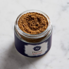 Photograph of Ayurvedic Spice Thymol. Color is dark brown.