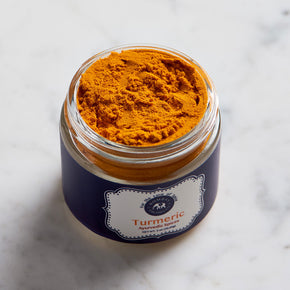 Photograph of Ayurvedic Spice Turmeric grounded. Beautiful yellow color 