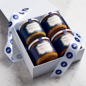 Photograph of Gift Box of Four Authentic Gourmet Simmer/Cooking Sauces. Beautifully wrapped. 